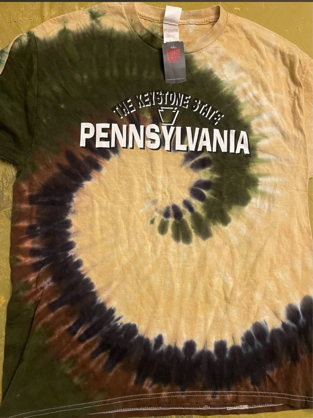 Large Tie-dye Pennsylvania t-shirt with spiral design in brown, black, and beige